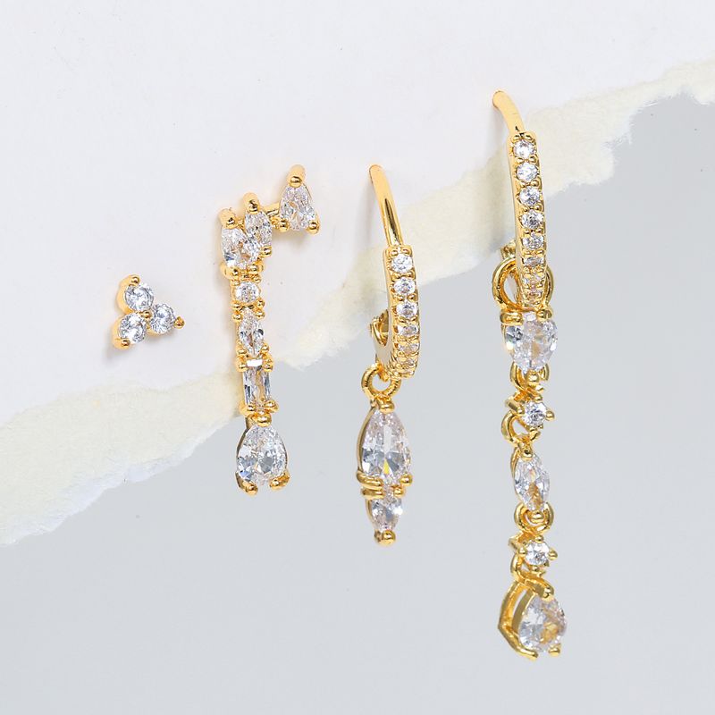Modisches Ohrring-Set mit geometrischen Zirkonia-Ohrsteckern und Ohrschnallen_voghion.com