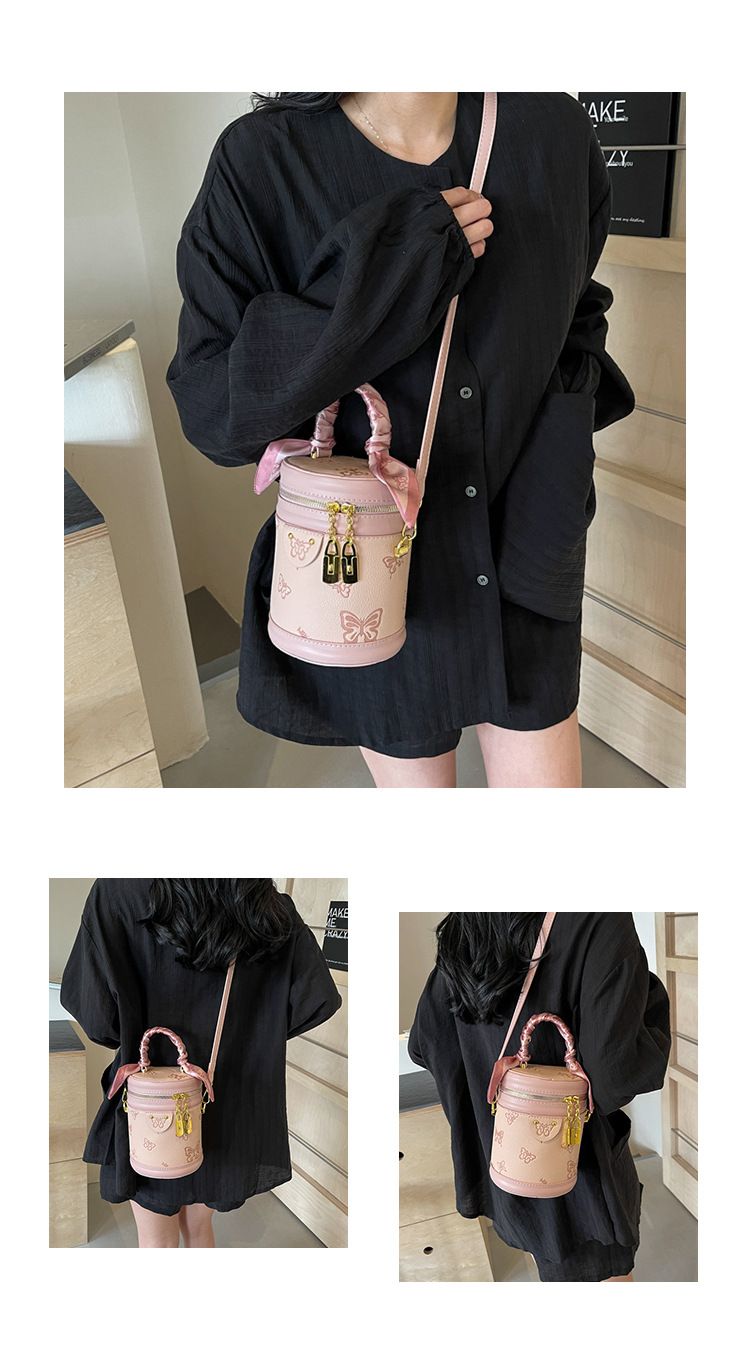 Borsa da donna retrò con motivo a farfalla, borsa a secchiello con colori a contrasto, borsa cilindrica da donna, borsa a tracolla con texture alla moda, design di nicchia_voghion.com