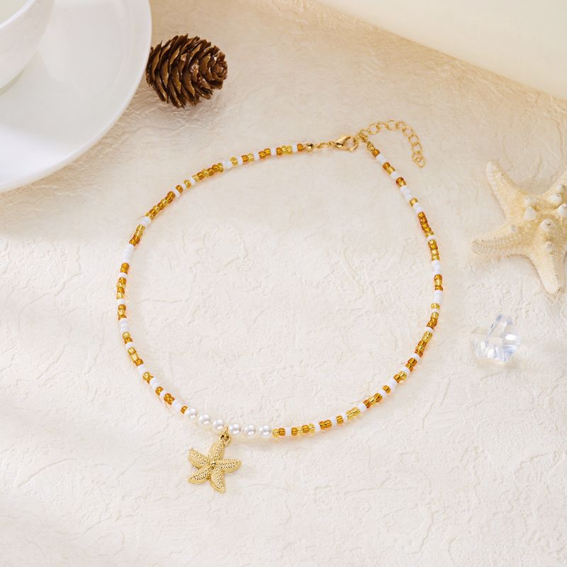 Collana girocollo con perle di riso semplici per donna, casual, versatile, da spiaggia, a forma di stella marina_voghion.com