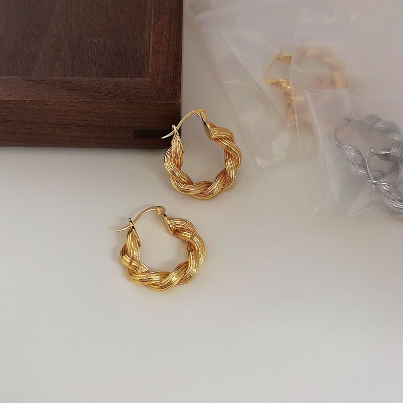 Boucles d'oreilles dorées torsadées nouées pour femmes, design de niche haut de gamme, légères et françaises_voghion.com