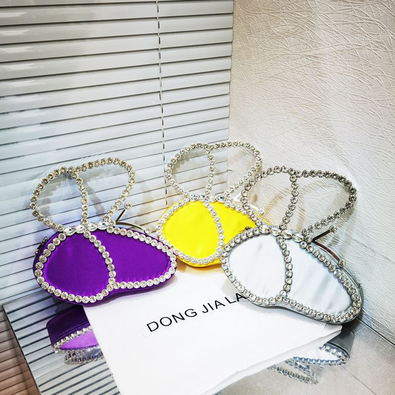 Borsa a mano con pochette da sera lucida con strass e farfalla da donna, 2023_voghion.com