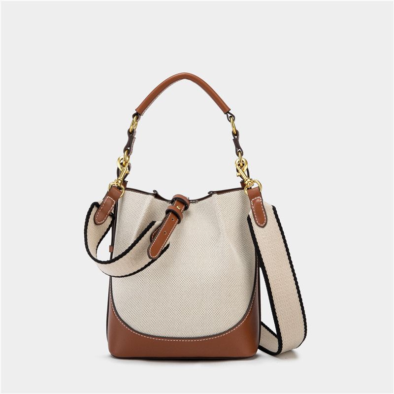 Spain 2025 New Women's Brown Pleated Drawstring Versatile Handbag Bucket Wide Shoulder Strap Crossbody Bag_voghion.com