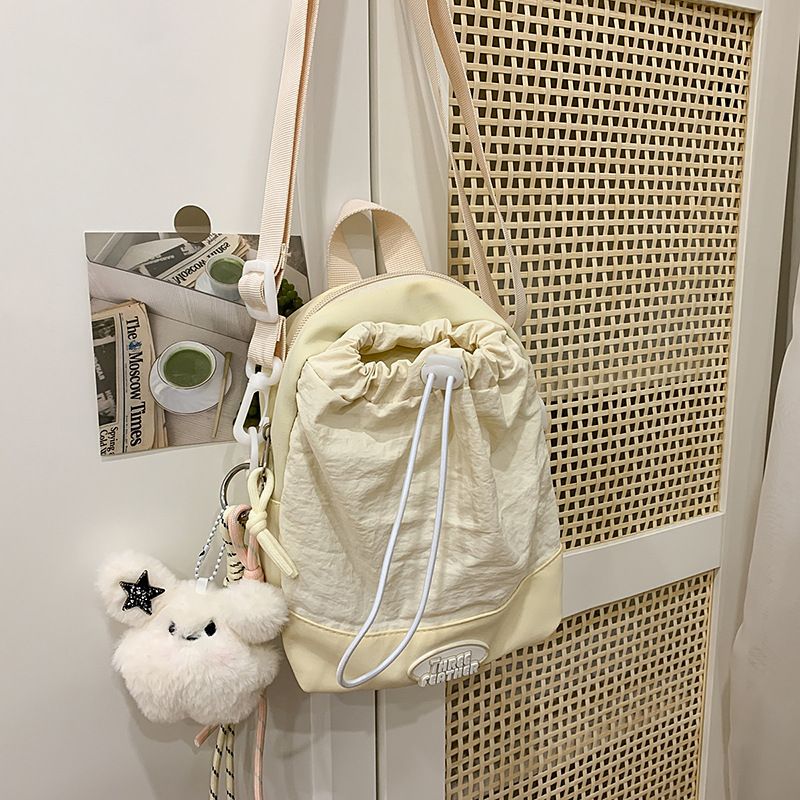 Summer High-End Commuter Phone Small For Women 2025 New Beige Lightweight Outdoor Canvas Crossbody Water Bottle Bag_voghion.com