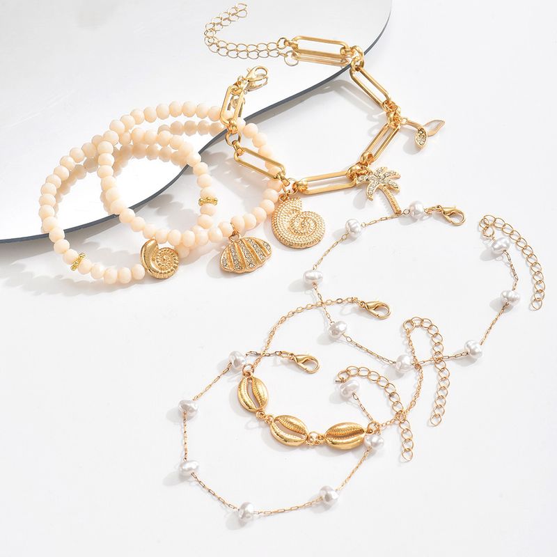 Bohemian Bracelet Wholesale European And American New Holiday Style Rice Beads Alloy Conch Shell Pendant Bracelet Set_voghion.com