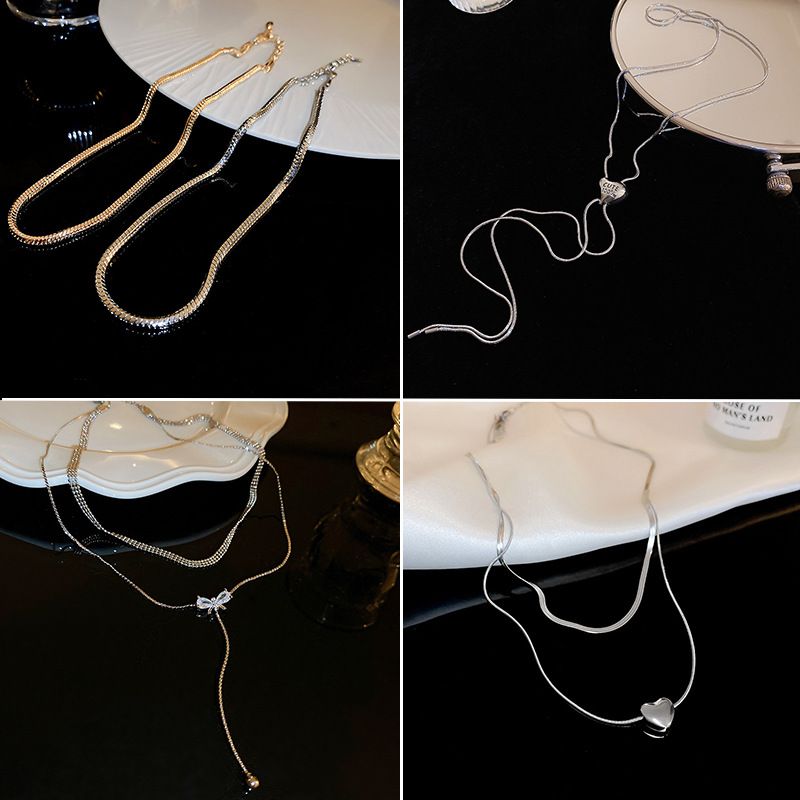 Collana di perle con nappa e spilla a forma di cuore, stile coreano, minimalista, da pendolare, con clavicola, catena per maglione, gioielli di alta qualità_voghion.com