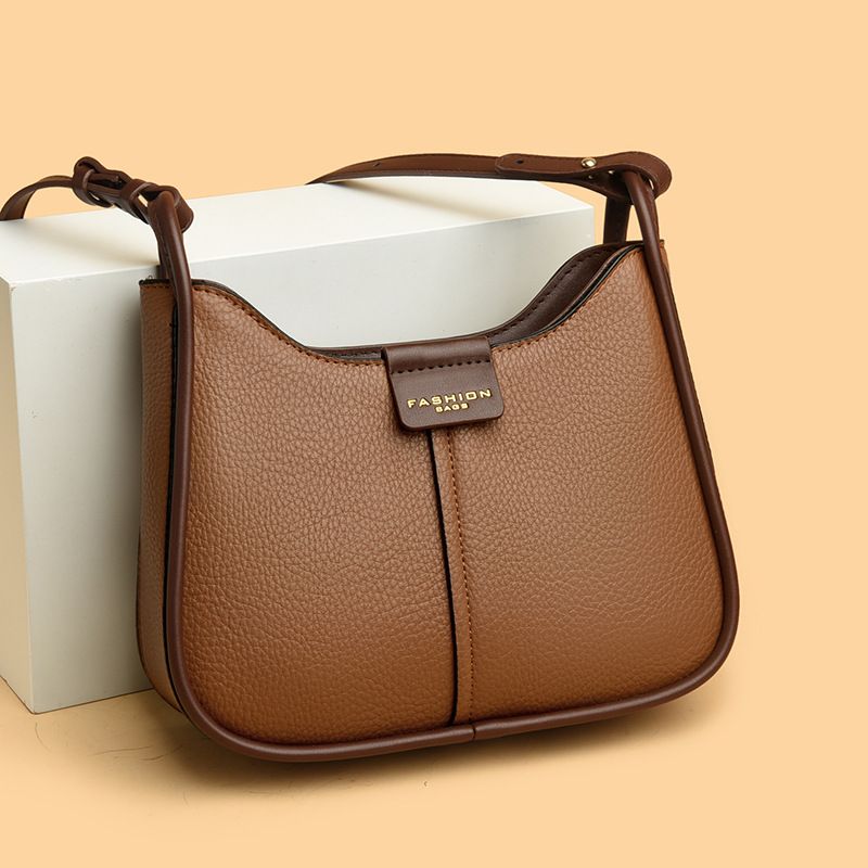 La borsa a tracolla monospalla di tendenza di quest'anno per le donne, in vera pelle, dal design di nicchia, di alta qualità, per i pendolari._voghion.com