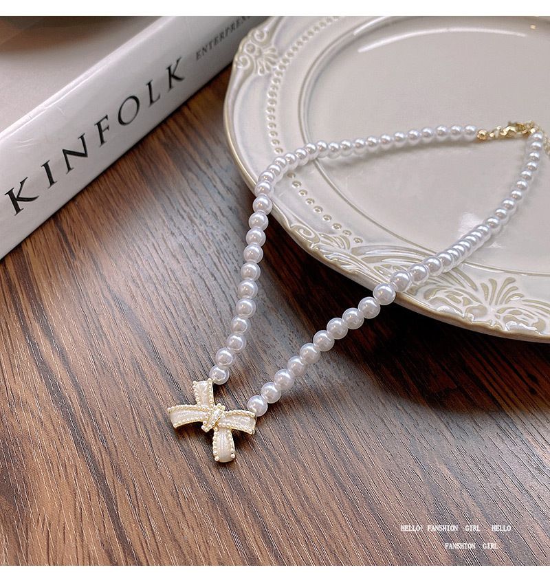Elegante parelketting voor vrouwen in stijl, licht luxe niche-ontwerp, veelzijdige strik sleutelbeenketting_voghion.com