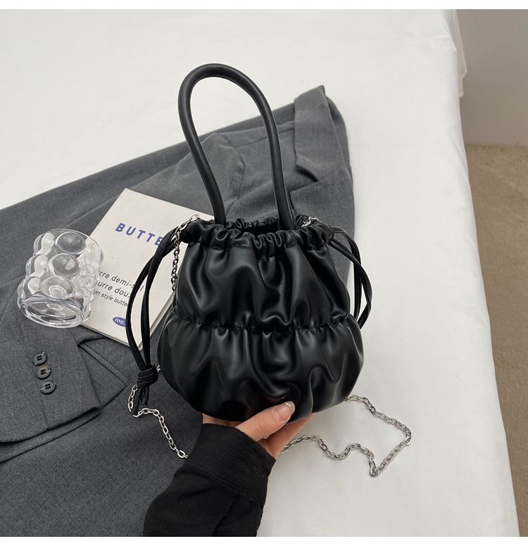 Korean high-end soft glutinous cloud bucket bag, niche pleated handbag, cute ins shoulder crossbody bag_voghion.com