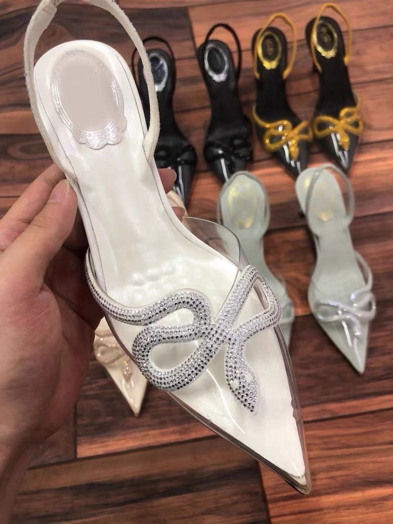 Γυναικεία ψηλοτάκουνα πέδιλα με φίδι και στρας, λεπτό τακούνι, μυτερό, άνοιξη και καλοκαίρι 2025, νέα σέξι συσκευασία, διαφανές κεφάλι_voghion.com