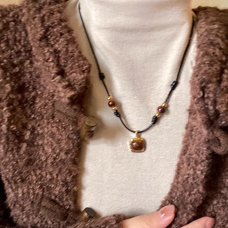 Collana con cordino in pelle e pietra occhio di tigre per donna, autunno e inverno, elegante catena per maglione di alta qualità, nuovo stile 2024._voghion.com