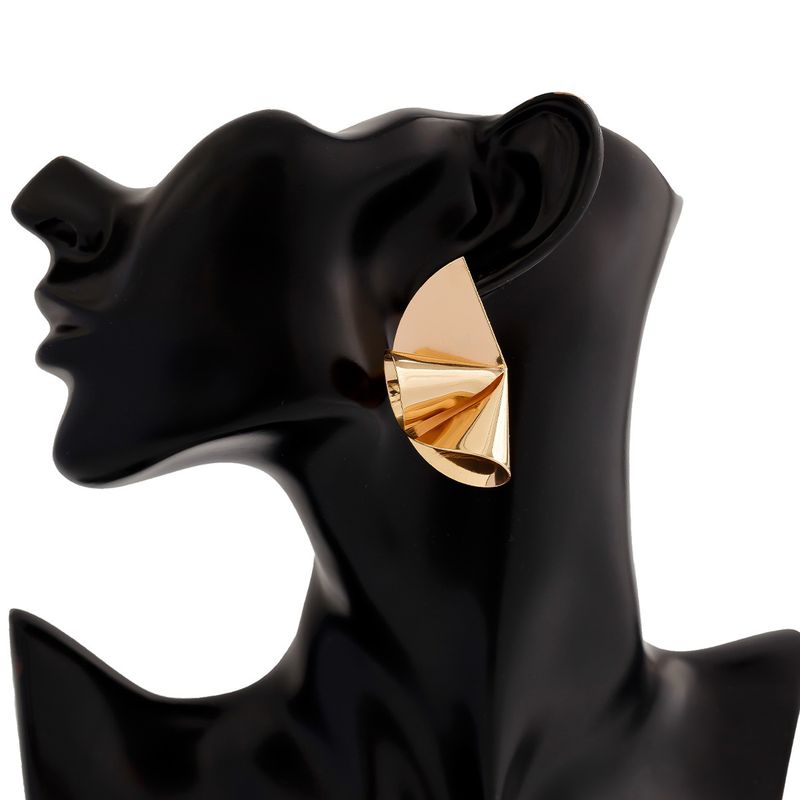 Personality metal geometric texture hollow earrings female irregular twisted glossy earrings earrings_voghion.com