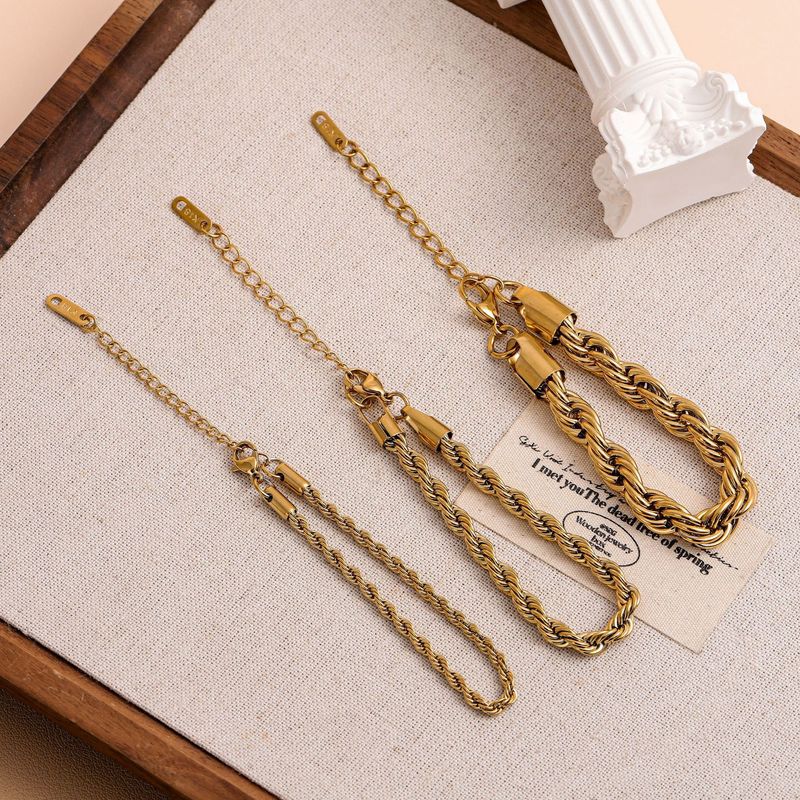 Bracciale intrecciato in rilievo a doppio strato placcato oro Zhenmang INS con anello semplice e personalità circolare elettroplaccato per uomo e donna_voghion.com