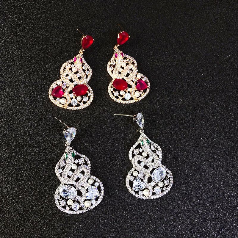 Orecchini a forma di zucca rossa con sangue di piccione in zircone per donna, lusso leggero, alta personalizzazione, serpente artificiale alla moda per Capodanno_voghion.com