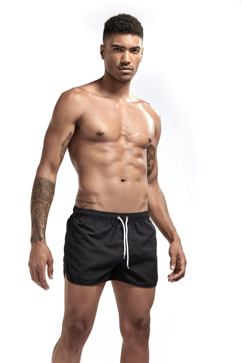 Men's clothing Fashion beach shorts Polyester quick drying multi-color sports quarter pants_voghion.com