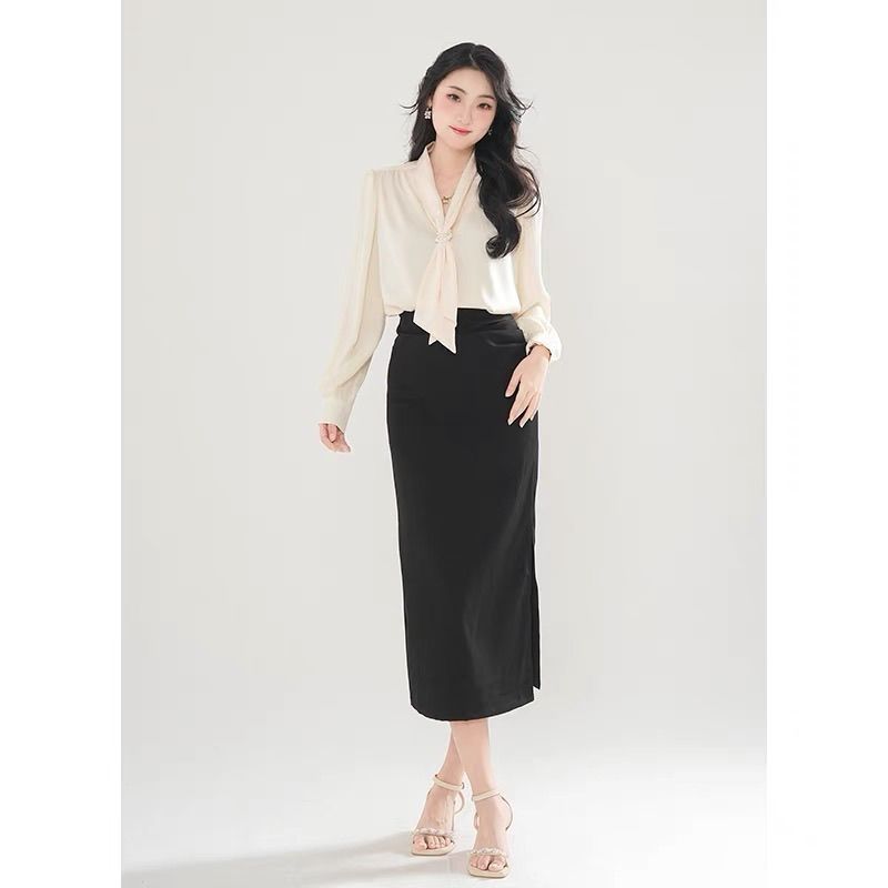 Novità primavera 2025, elegante completo da due pezzi con gonna e camicia a maniche lunghe con fiocco_voghion.com