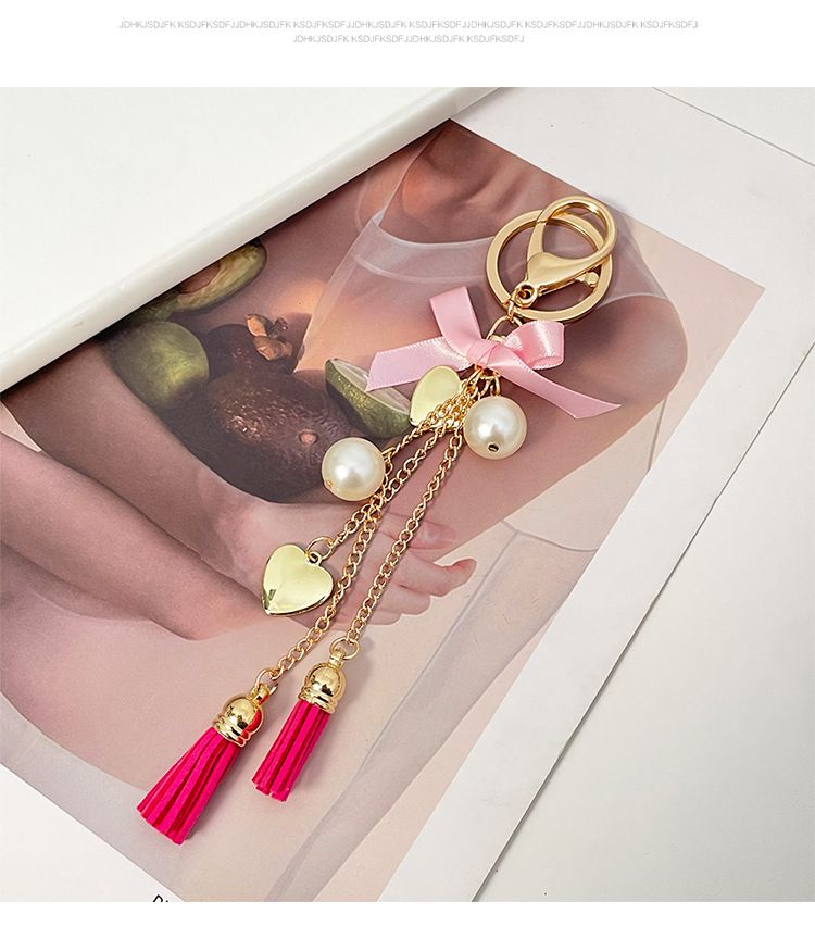 Neue exquisite Bowknot Quaste Herz Auto Schlüsselanhänger Telefon Fall Tasche Anhänger kleine Geschenk Dekoration_voghion.com