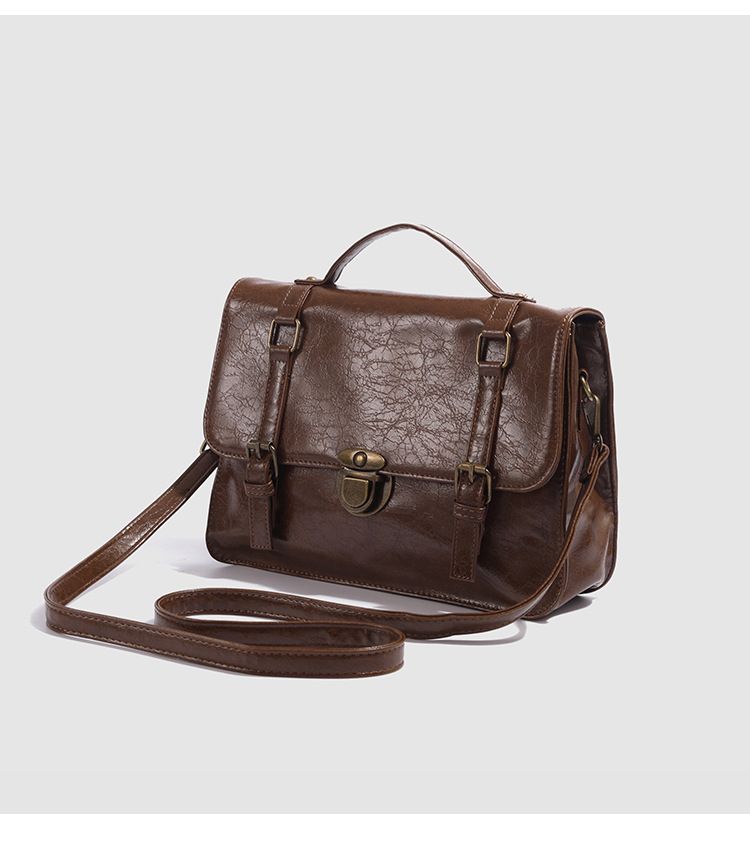 Mochila vintage estilosa com cadeado para mulheres e homens - Bolsa carteiro escolar de grande capacidade com alça ajustável, preta e marrom_voghion.com