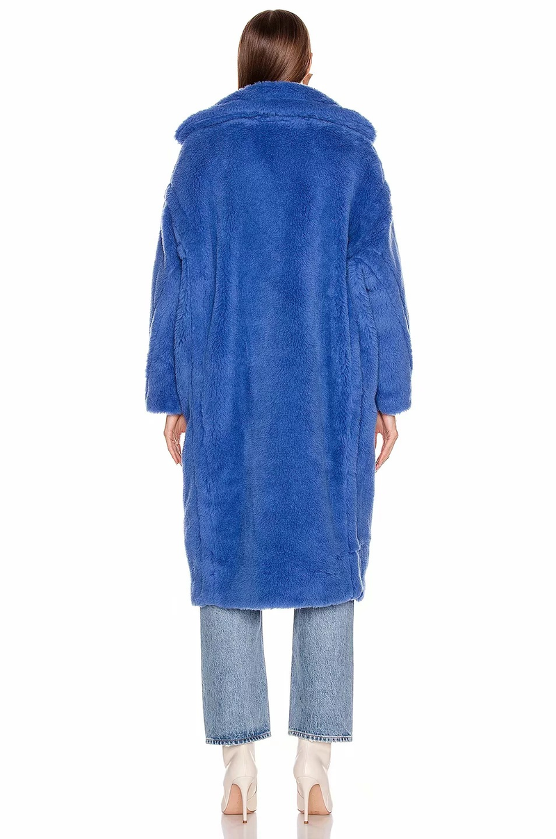 Cappotto da donna in lana di agnello sciolto di media lunghezza alla moda_voghion.com