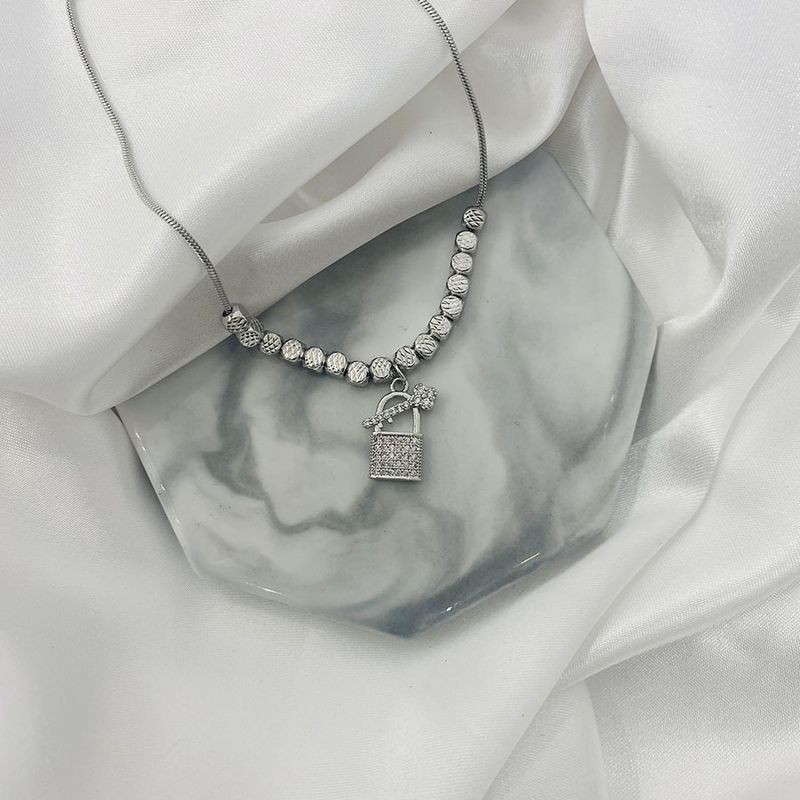 Korean East Gate Silver Micro Set Zircon Design Head Key Pendant Electroplated Lock Bone Chain Women's Necklace_voghion.com