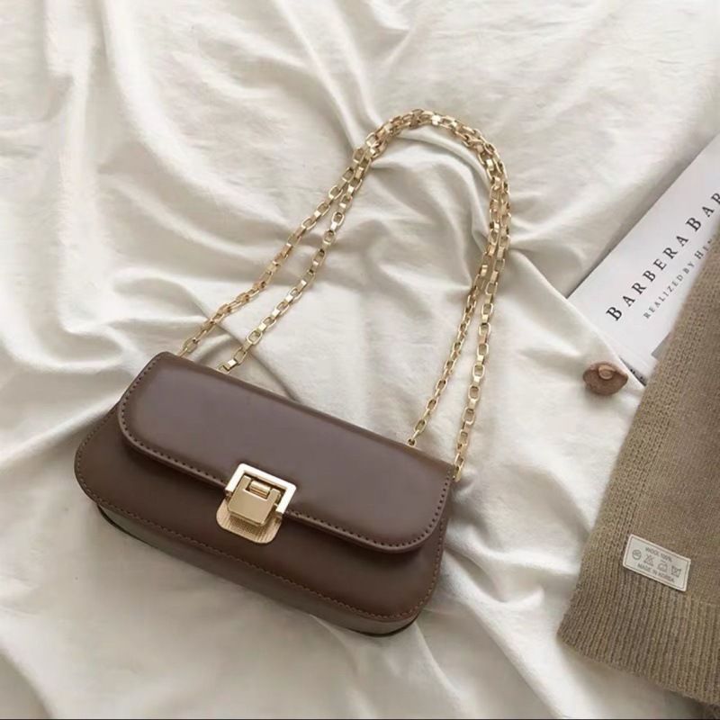 Borsa a tracolla versatile di alta gamma con catena sotto le ascelle, nuova tendenza 2024 per le donne francesi_voghion.com