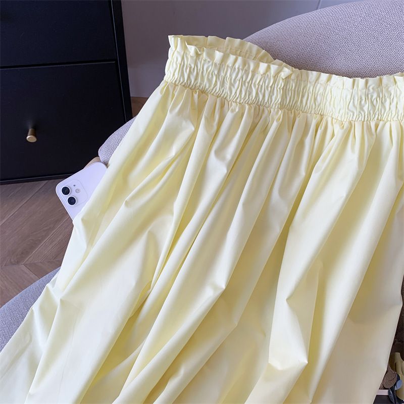 Gonna gialla da donna, a vita alta, a trapezio, sottile, di media lunghezza, con grande gonna a ombrello._voghion.com