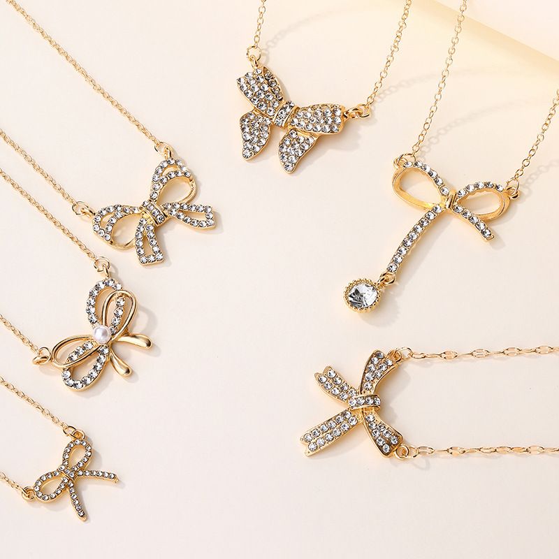 Kettenhalskette mit Anhänger, Schmuck, personalisiertes Design, Anhänger aus Legierung, vielseitig einsetzbar, einfache Halskette mit eingelegter Diamantschleife_voghion.com