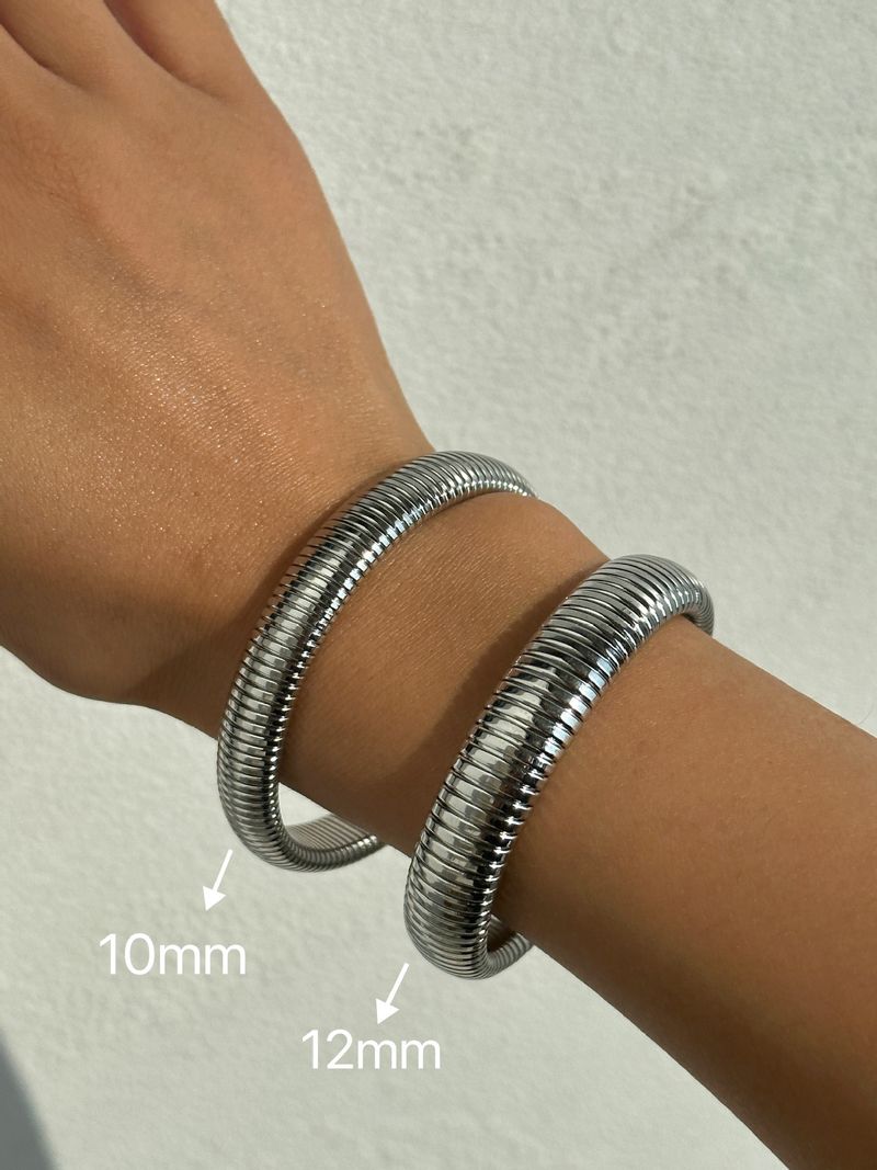 Bracciale Gypsy elastico in acciaio al titanio placcato oro vero_voghion.com