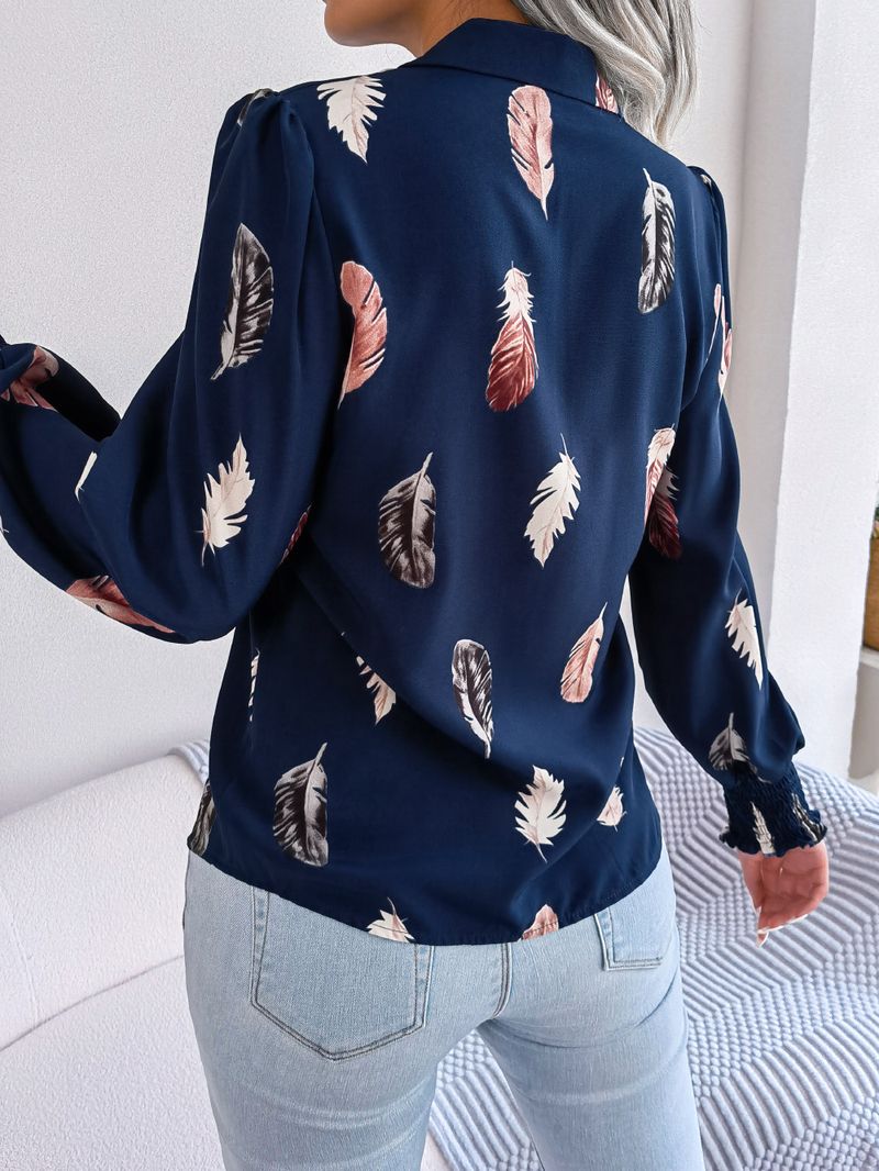 Abito da donna con camicia con risvolto e maniche a lanterna in piume di temperamento_voghion.com