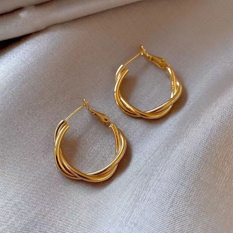 Ago d'argento Metallo Vento Circolare Geometrico Moda Pendolarismo Semplicità Semplice Cerchio Personalizzato Temperamento Di Alta Gamma_voghion.com