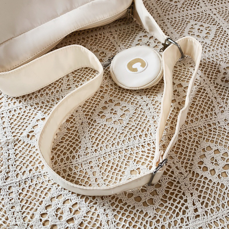 Bolso de Material de tela de nailon para mujer, nuevo diseño de nicho, diseño de banda ancha, bandolera de un hombro, bolso de bola de masa para mujer_voghion.com