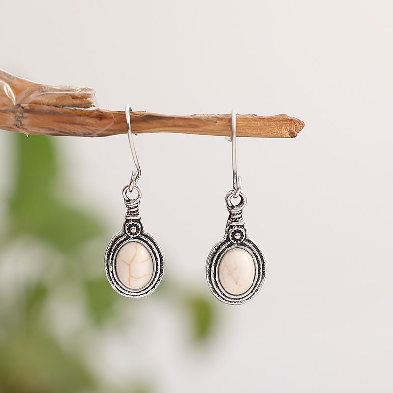 Nuovi orecchini creativi con fiori geometrici turchesi_voghion.com