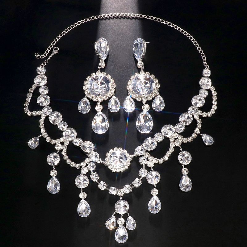Set di gioielli con collana di diamanti multistrato, orecchini pendenti a goccia d'acqua esagerati e sexy_voghion.com