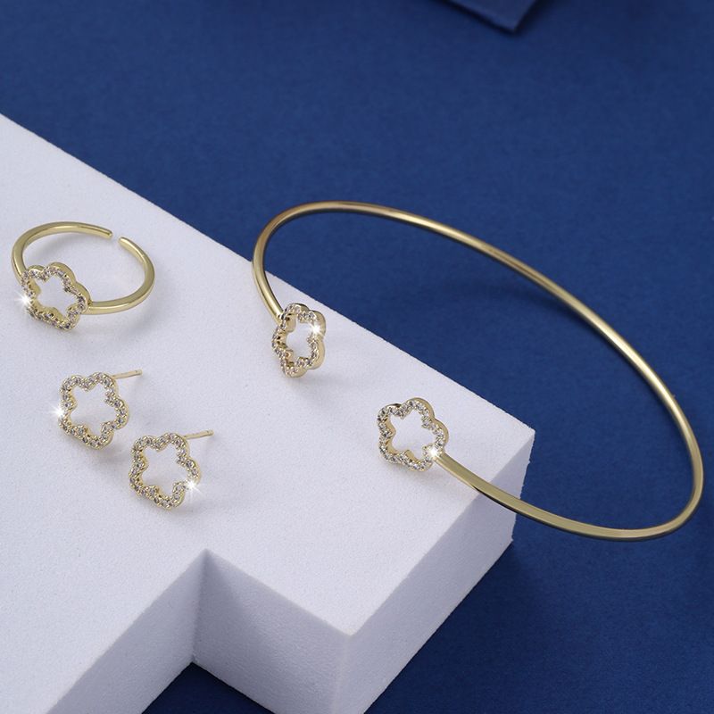 Women's Fashion Banquet Wedding Jewelry Set New Hollow Five petal Flower Diamond Bracelet Ring Earrings Three piece Set Five Leaf Flower Jewelry Set_voghion.com