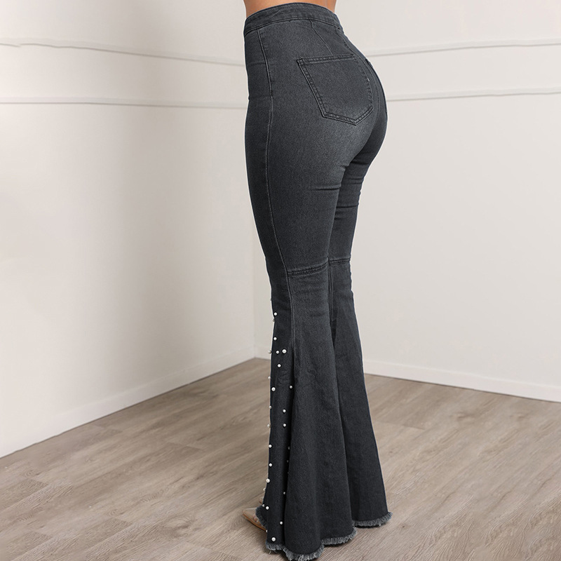 Stretch-casual jeans met uitlopende pijpen en kralen voor dames_voghion.com