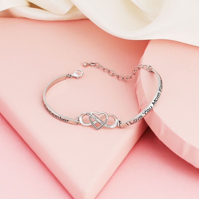 Bracciale da donna in acciaio inossidabile alla moda, con croce a forma di cuore tempestata di diamanti, in stile coreano e giapponese, con 8 caratteri incisi_voghion.com
