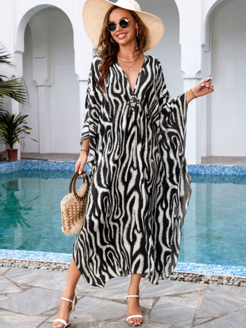 „Strandkleid mit Bohemian-Print – Fließendes langes Kleid für Pool und Urlaub“_voghion.com