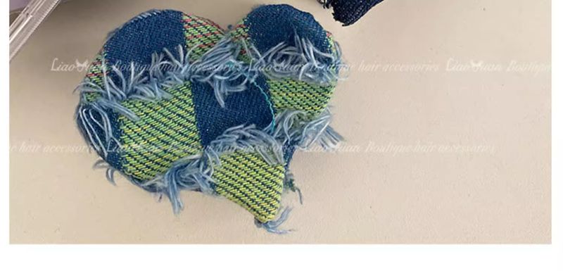 Niche design haute queue de cheval pince à saisir femme 2024 nouvelle haut de gamme amour demi cravate épingle à cheveux arrière tête requin pince_voghion.com