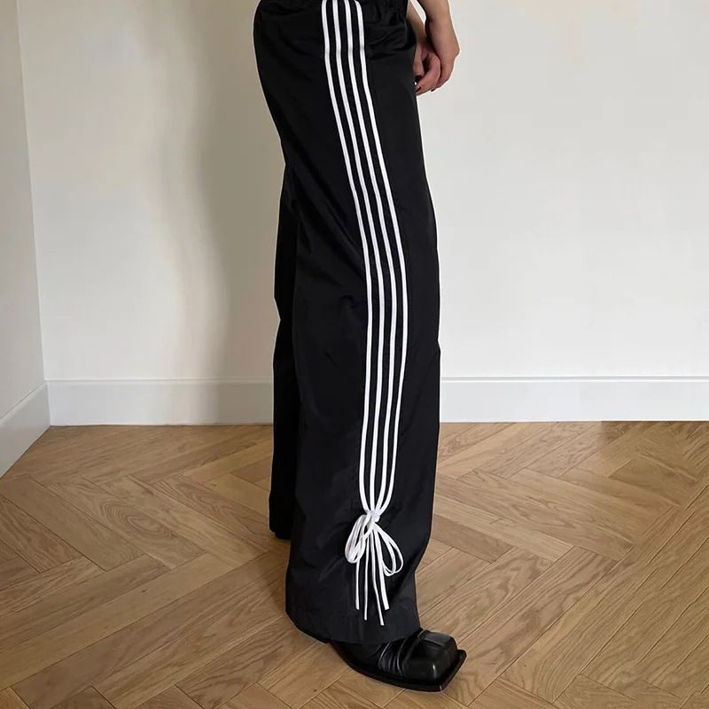 Lässige Jogginghose für Herren – Stylische, locker sitzende Trainingshose mit Taschen, bequemes Polyestergewebe, Schwarz mit Leopardenmuster_voghion.com