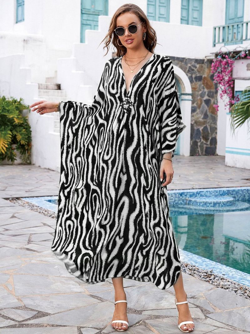 „Strandkleid mit Bohemian-Print – Fließendes langes Kleid für Pool und Urlaub“_voghion.com