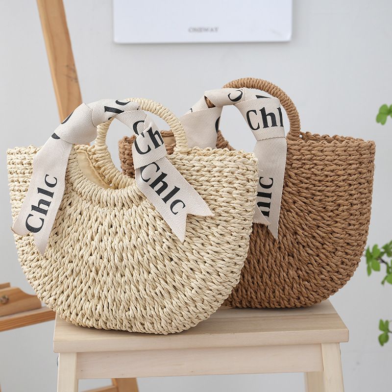 Handheld Paper Woven Women's Straw Vacation Handbag Round Bucket Bag_voghion.com