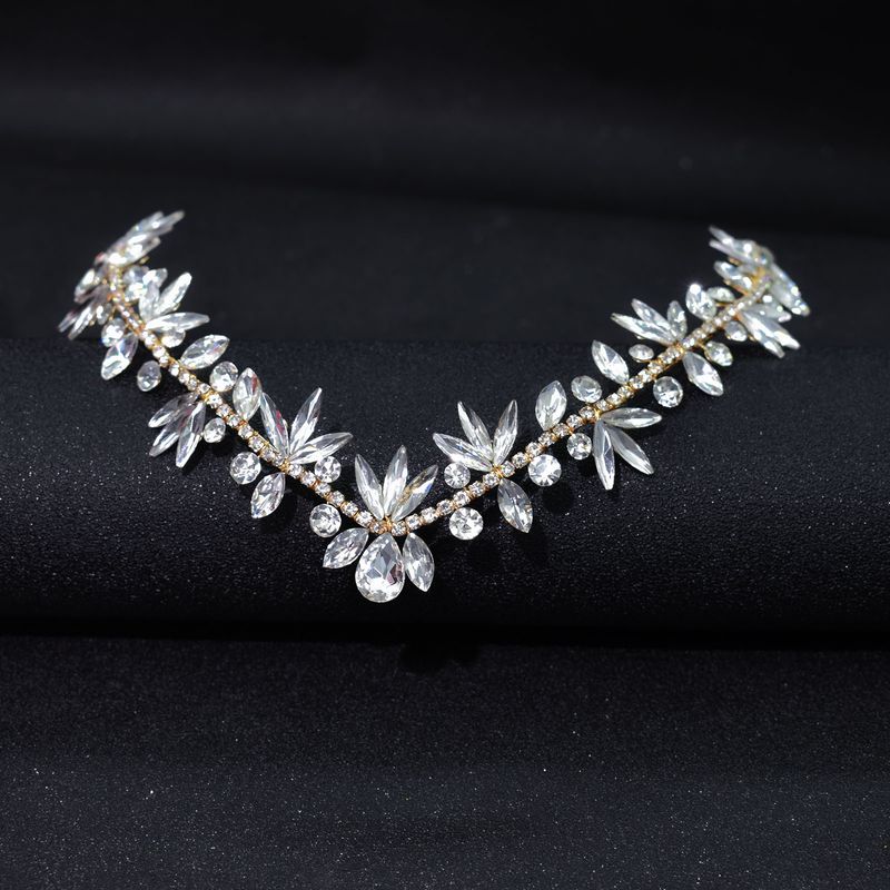 Κοσμήματα και αξεσουάρ Νυφική κόμμωση, κορδέλα με αλυσίδα από στρας, αξεσουάρ φορέματος με κότσο μαλλιών με ένθετα διαμάντια_voghion.com