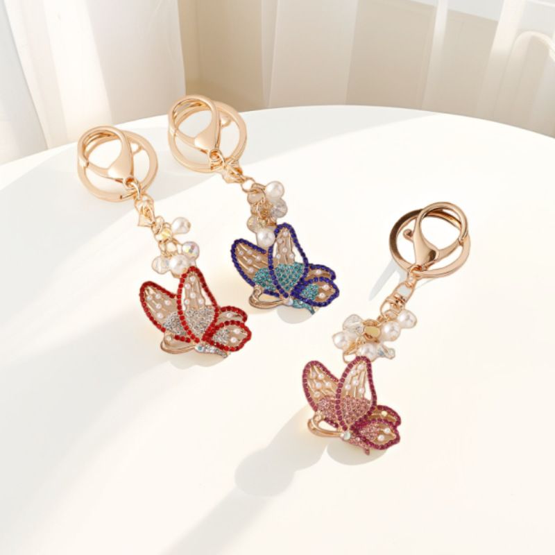 Portachiavi con ciondolo a forma di farfalla in lega di strass, creativo e alla moda coreana, per auto e borsa._voghion.com