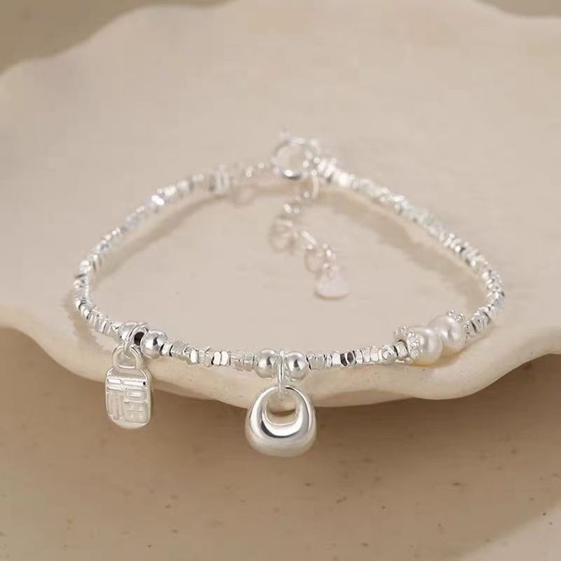 Borsa portafortuna piccola e pura, braccialetto in argento rotto, accessori da donna, nuovo design di nicchia cinese, temperamento leggero e lussuoso, squisito_voghion.com