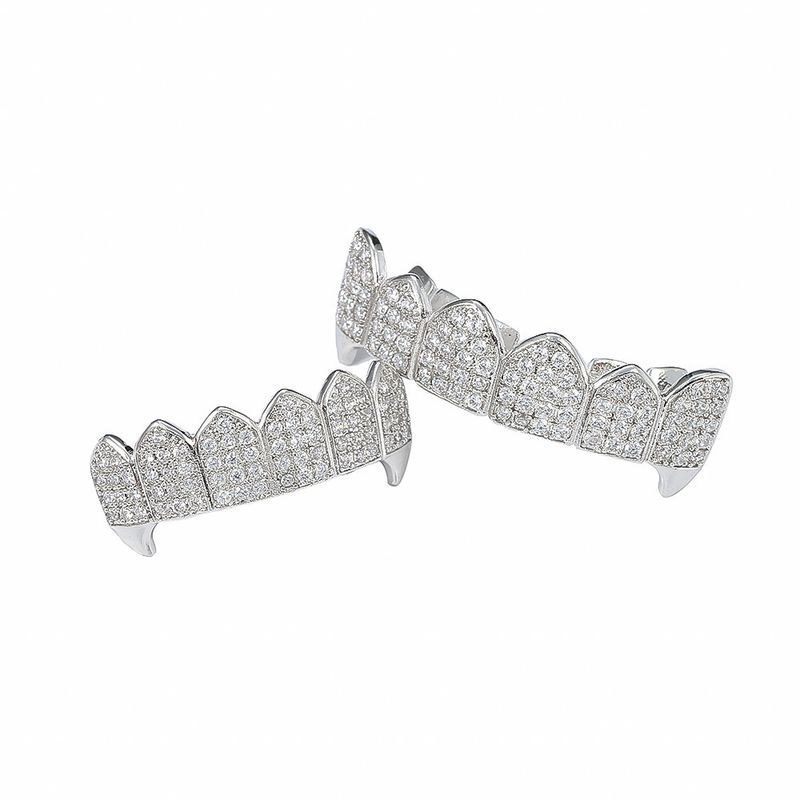bretelle hip hop, bretelle dorate, zanne da vampiro, denti in oro con micro intarsi in zircone, bretelle decorative alla moda_voghion.com