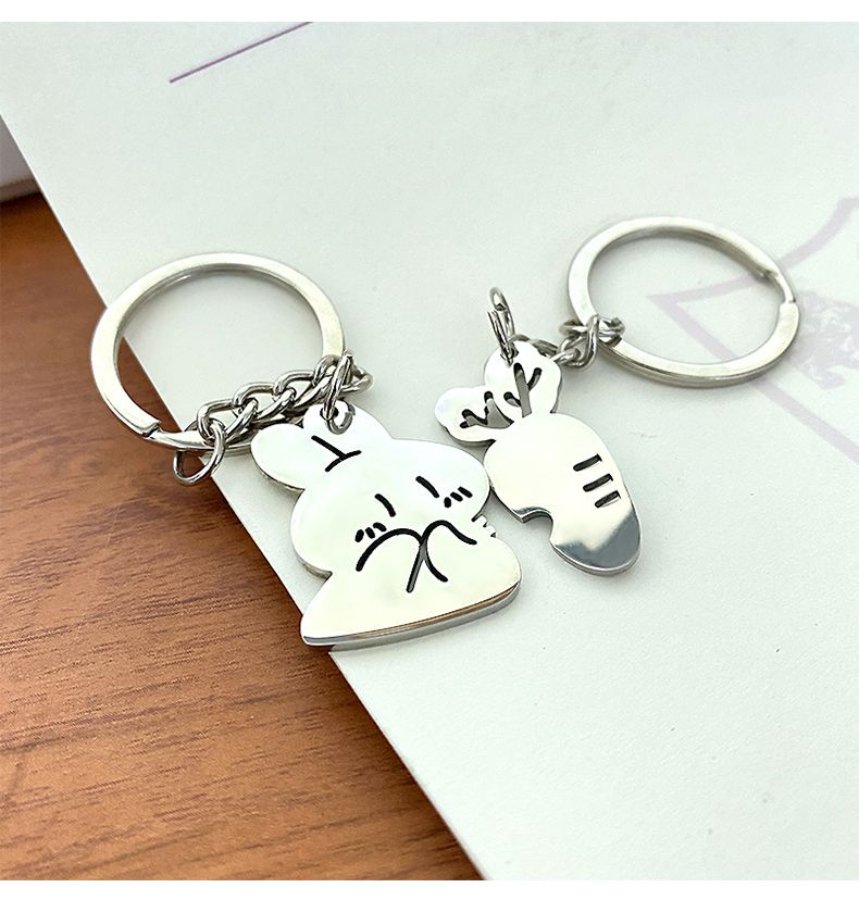Portachiavi in acciaio inossidabile 304 con ciondolo a forma di coniglio e carota, stile coppia, un paio di simpatici cartoni animati._voghion.com