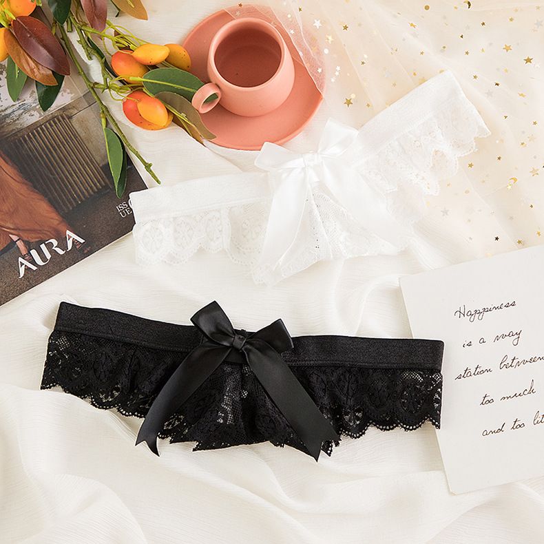 Roupa íntima sexy tanga transparente de renda com laço grande_voghion.com