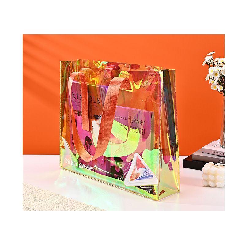 Straight color PVC laser bag for women's clothing store, fashionable high-end shopping handbag_voghion.com