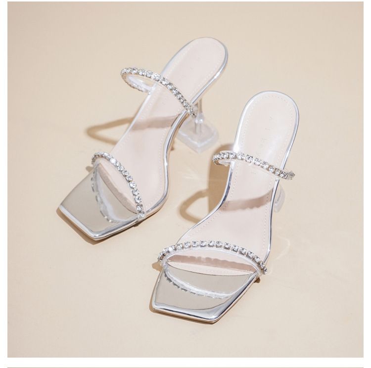 neue Strass-Sandalen mit einem Riemen und hohen Absätzen für Damen mit Stilettos, transparente und wunderschöne silberne High Heels_voghion.com