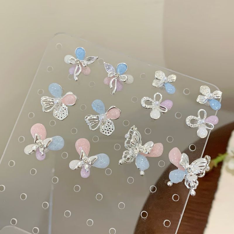 Nuovi orecchini a farfalla colorati per la primavera e l'estate per le donne, stile fata con aghi d'argento e fiori, sensazione di alta qualità di nicchia,_voghion.com