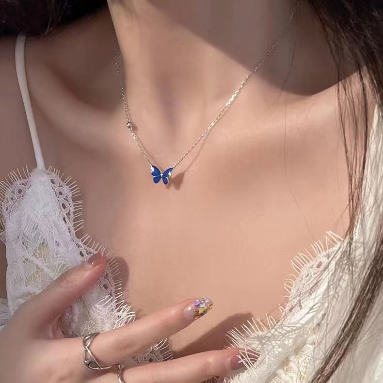 Collier papillon changeant de couleur pour femme, pendentif papillon au design de niche, léger et luxueux, chaîne de clavicule polyvalente_voghion.com